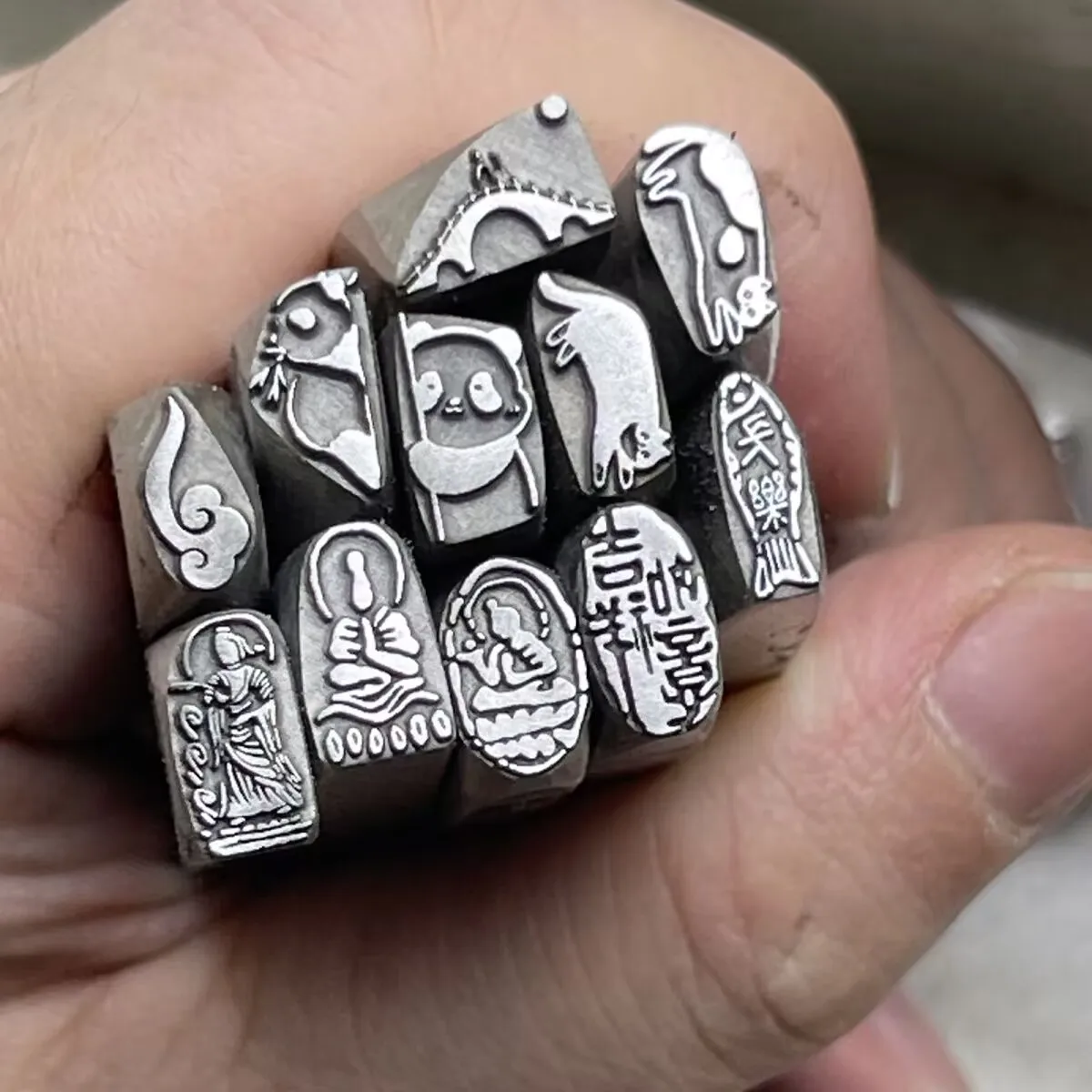 Jewelry Stamps, Panda Buddha Statues, Steel Stamps, Gold and Silver Bracelets, Rings, Chiseling Molds, Gold-Beating Tools
