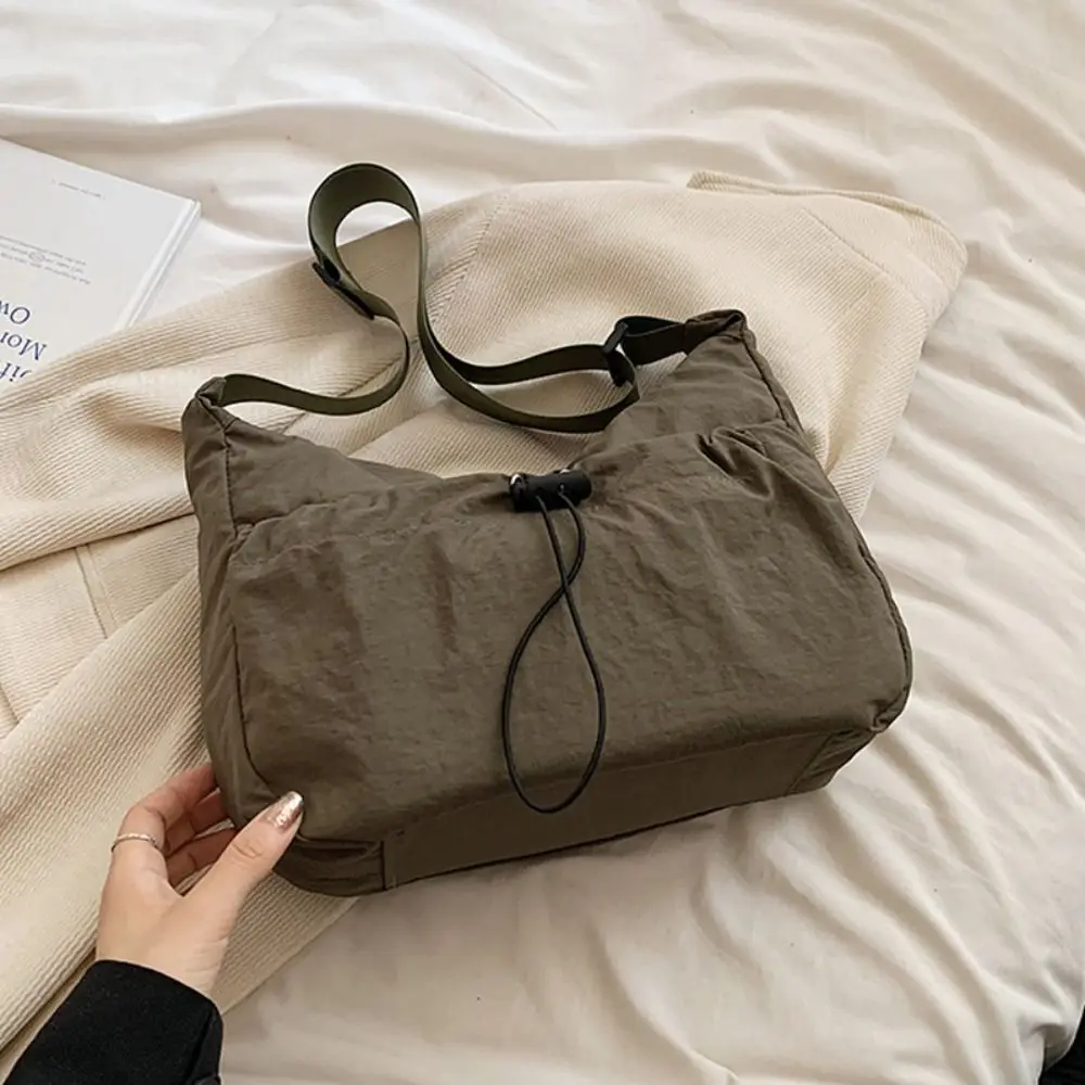 

Solid Color Nylon Shoulder Bag Adjustable Shoulder Straps Nylon Drawstring Bucket Bag Tote Bag Korean Style Canvas Crossbody Bag