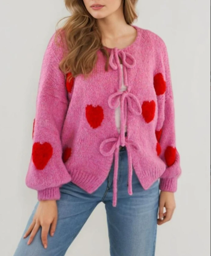 Heart shaped patterned long sleeved round neck cardigan with lace up details