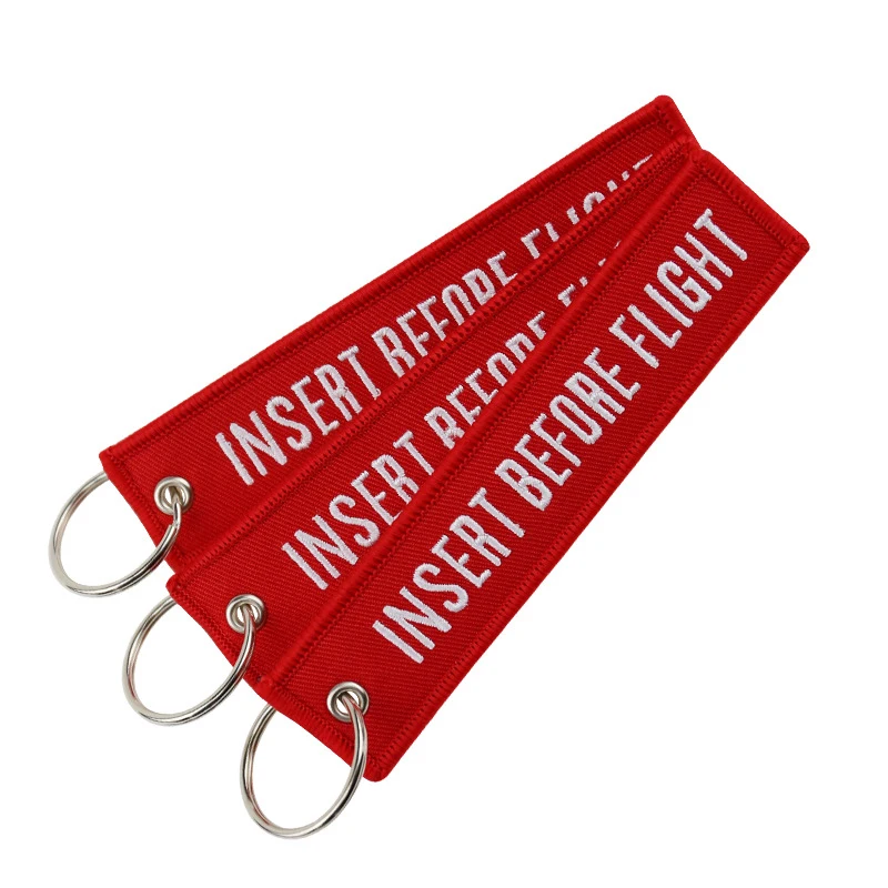 100Pcs Embroidery INSERT BEFORE FLIGHT Rectangle Keychain Flight Key Chain Souvenir Wholesale