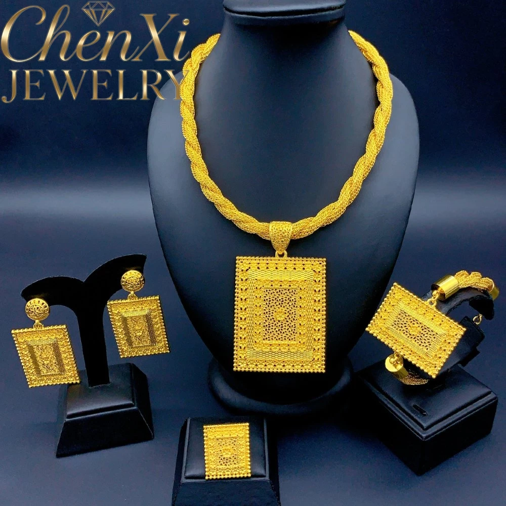 collier-en-or-alluvial-avec-pampille-et-fleur-ajouree-porte-bonheur-breloques-elegantes-piece-phare-souvenir-haut-de-gamme-luxe-exquis-cadeau-jeune-et-raffine