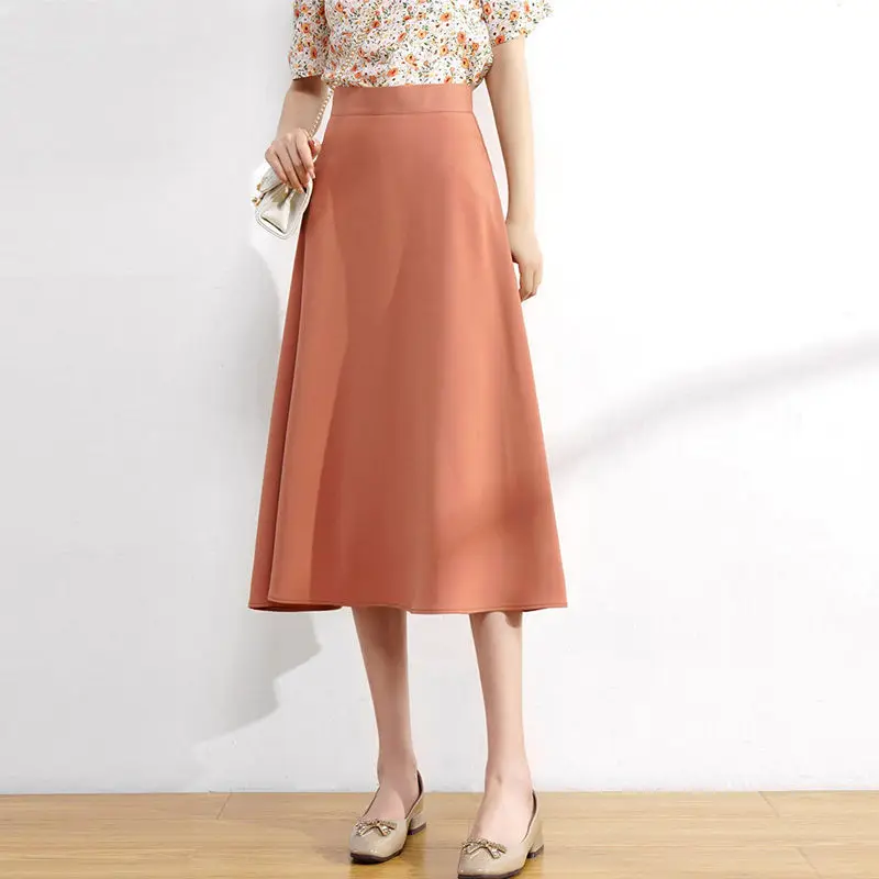 

2024, новинка, темпераментная корейская однотонная женская летняя простая модная элегантная универсальная облегающая юбка трапециевидной формы средней длины на молнии