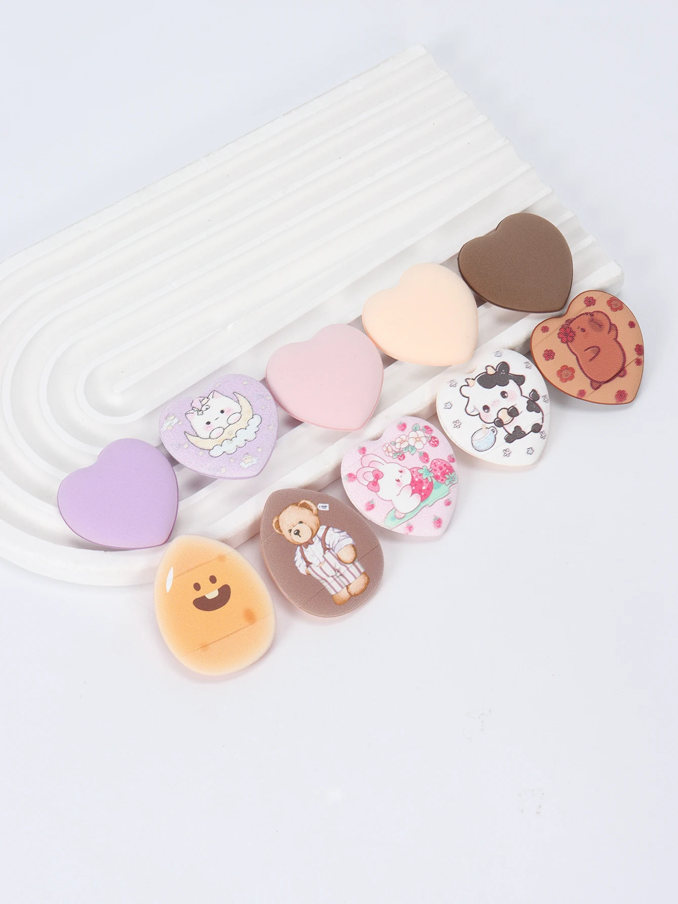 ランダムに印刷された指用パウダーパフ 5-10-20-50-100 個、水にさらされると膨らむ、湿った状態でも乾いた状態でも使用できます