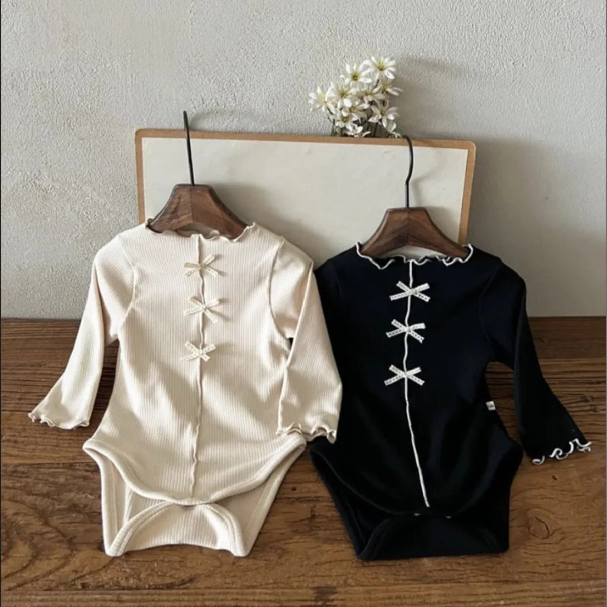 

2026 Spring New Baby Long Sleeve Bodysuit Cotton Infant Girls Solid Bow Ribbed Jumpsuit Toddler Sweet Princess Clothes 0-24M
