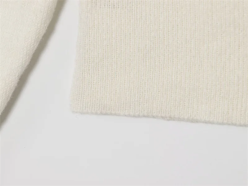 Omen's Top Nouveau pour l'automne 2025 Blanc à manches longues Style européen et américain Une épaule Tricot ample Sexy Mode Décontracté Personnel