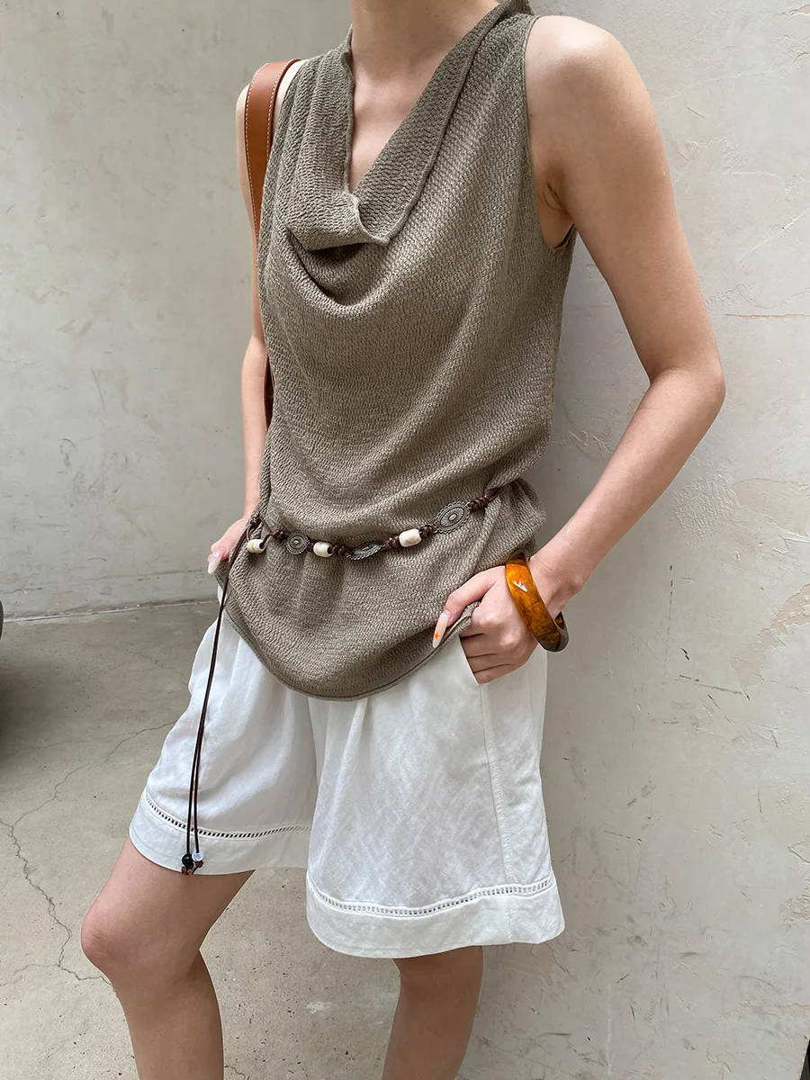 Sommerliche Damen-Shorts in unifarbenem Design mit hohler Textur, elastischem, hohem Bund, schlank machendem und lockerem, weitem Bein. – Detail 29