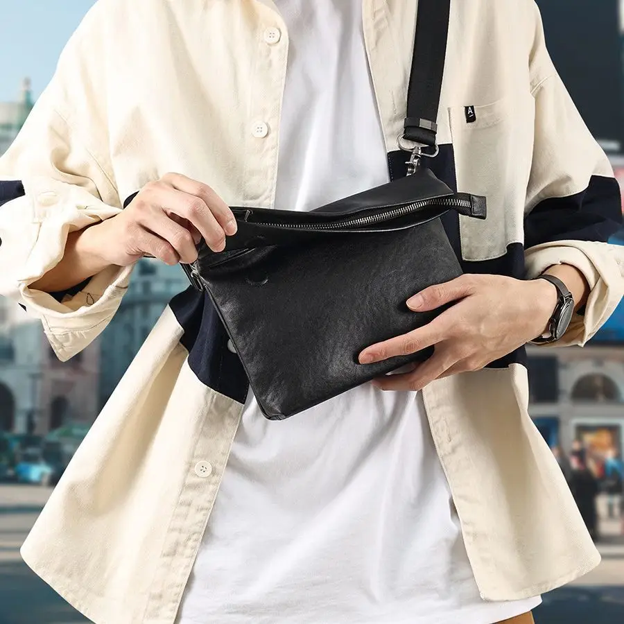 Nieuwe Multifunctionele Casual Heren Tas Koeienhuid Kleine Tas Mannelijke Lederen Trend Enkele Schouder Messenger Tas High-End Heren Tas