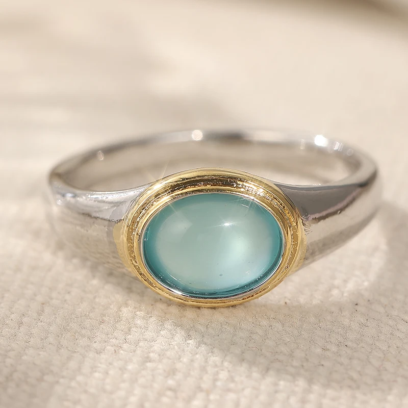 Eleganter Damenring mit eingelegtem meerblauen Stein, trendiger zweifarbiger Schmuck für den Alltag, Party-Schmuck, Jubiläumsgeschenk – Detail 1