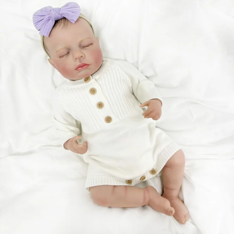 Lalka Reborn Loulou z miękkiego materiału/pełnymi winylowymi ramionami, 19 cali, realistyczna, z wielowarstwową malowaną skórą, ręcznie malowanymi włosami i widocznymi żyłkami.