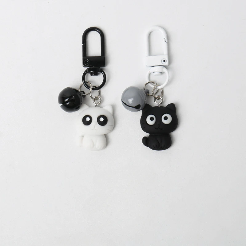 Porte-clés de voiture polyvalent chat noir et blanc créatif, pendentif mignon, sac à dos