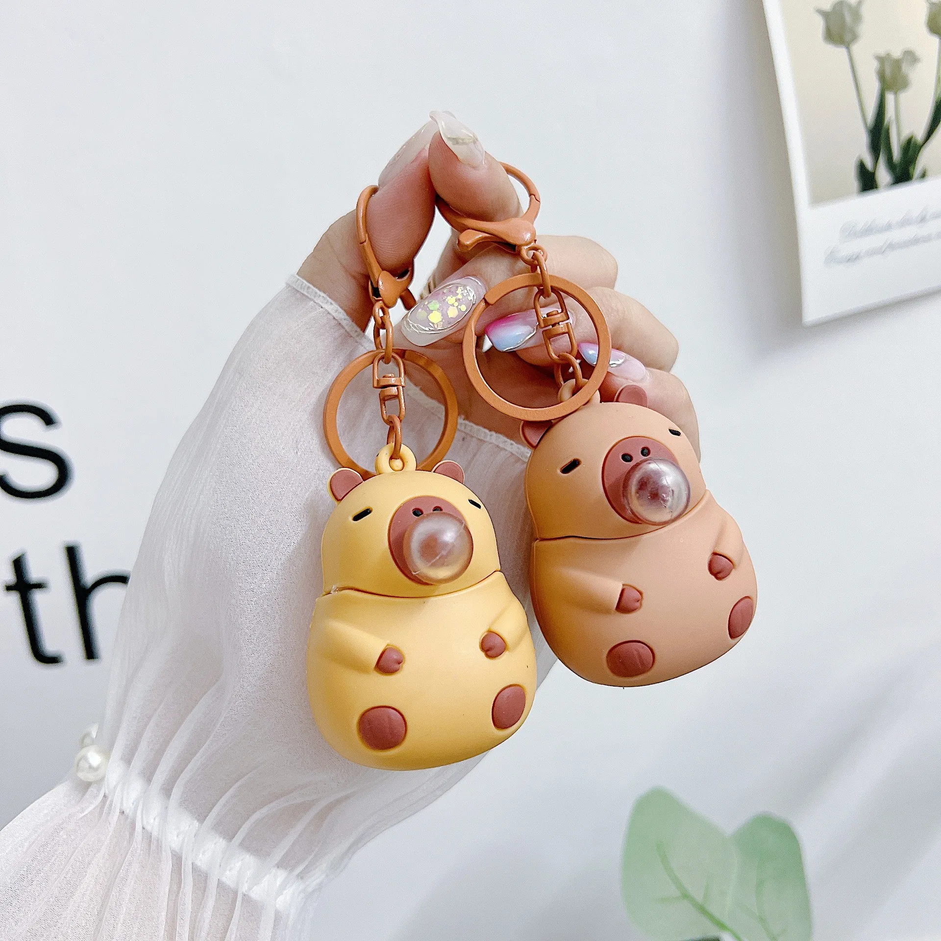 Llavero Capibara con pellizco en relieve, muñeca bonita y feliz, accesorio para bolso de pareja, cadena, colgante para coche, pequeño regalo