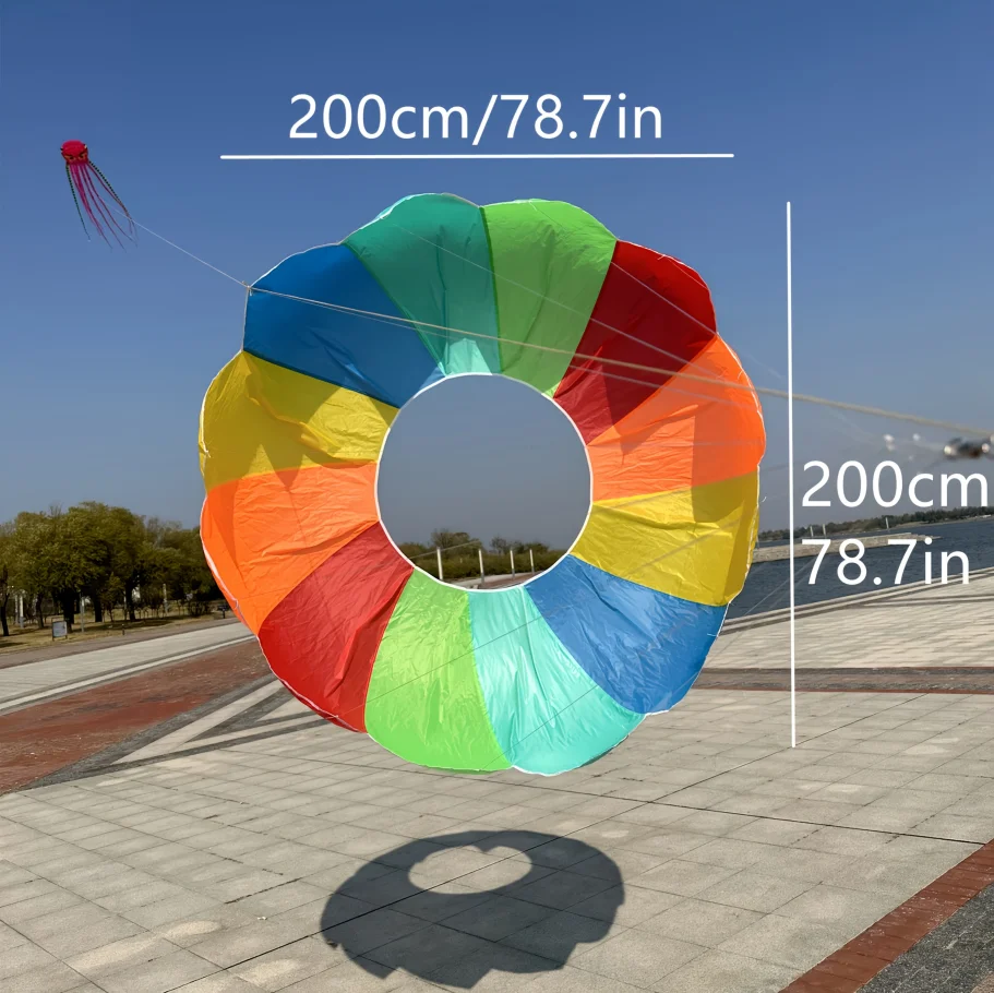 Outdoor hand pulled rolling dragon kite, adult spinning soft rainbow kite, beach park camping and flying view 3