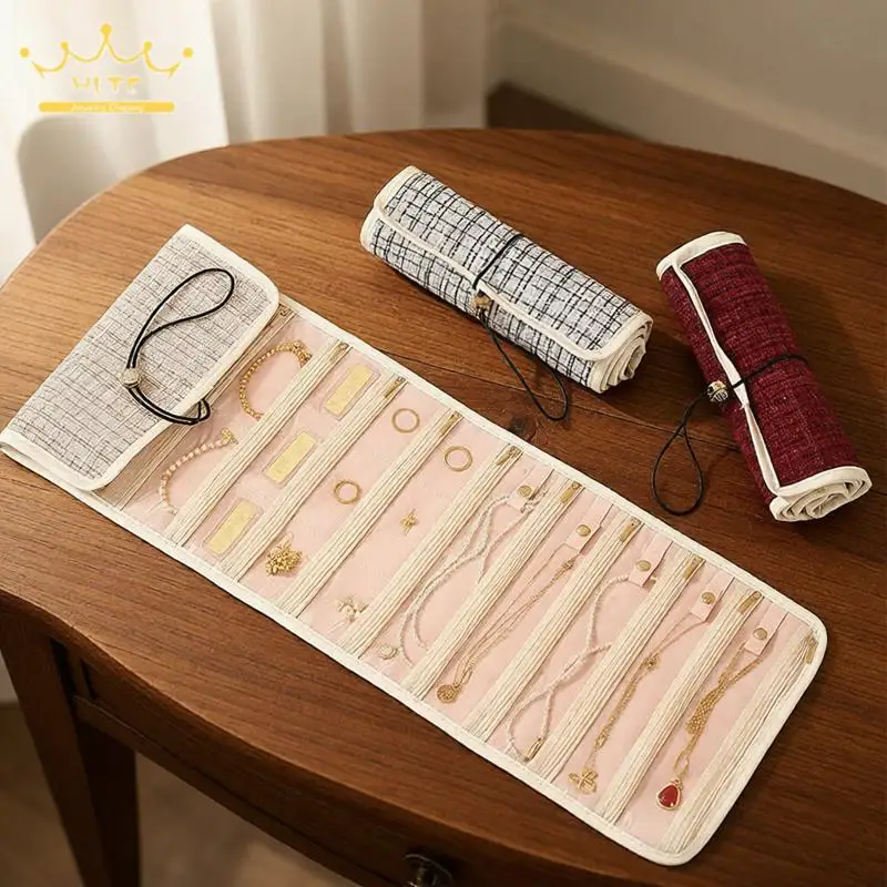 

Multifunctional Jewelry Storage Bag for Earrings Rings Necklaces Bracelets with Transparent Compartments to Prevent Oxidation