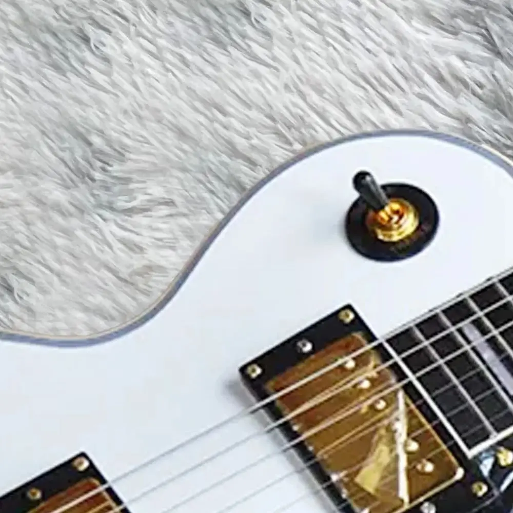 

Custom Shop 6-String White Electric Guitar with Black Pickguard Floyd Rose Bridge and Gold Hardware