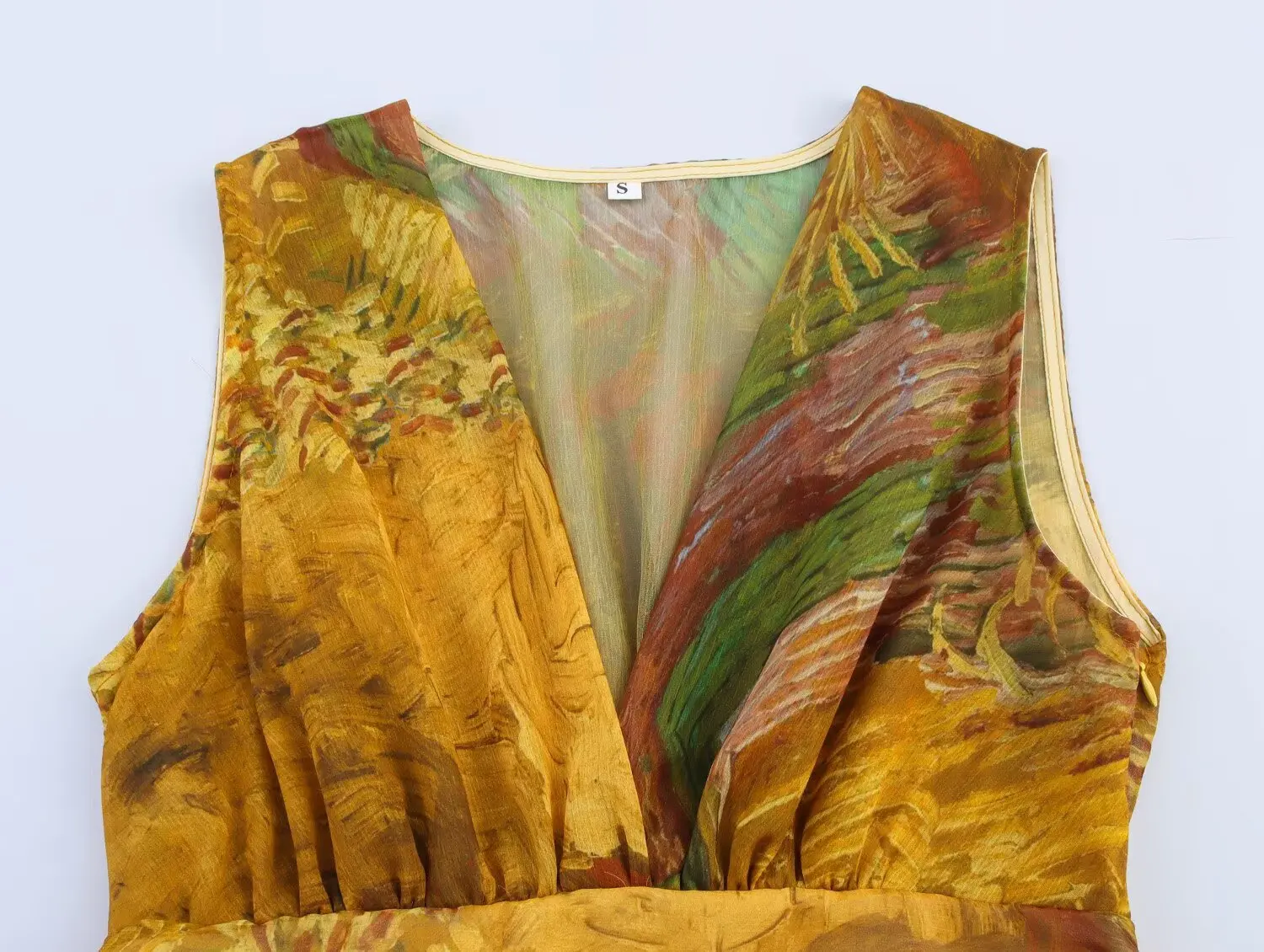 Abito longuette a strati con scollo a V senza maniche da donna del nuovo arrivo 2025 con motivo astratto e cintura