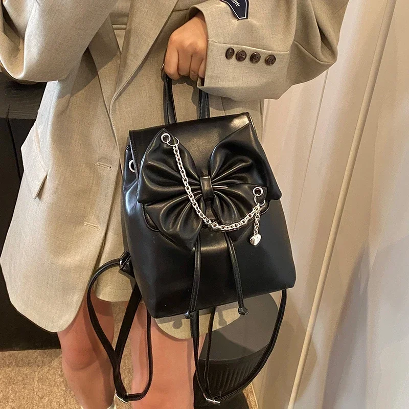 

Hot Selling High-quality Solid Color Stitching Casual PU Women's Backpack 2025 New Versatile Large Capacity Handbag Bow Buckle