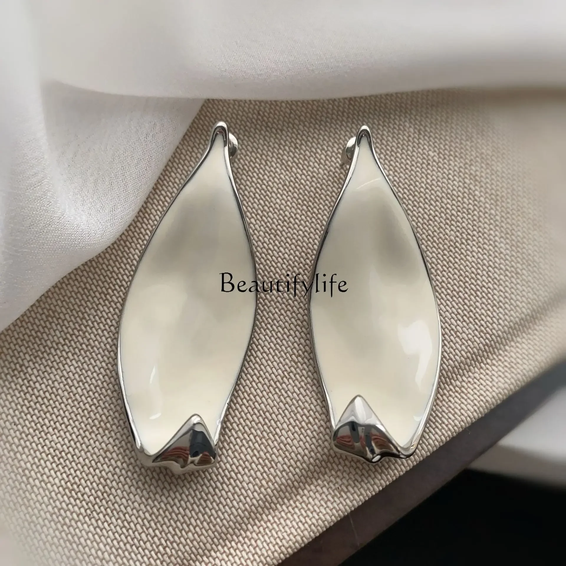 

White enamel oil drop color leaf roll gold-plated design earrings light luxury plant series versatile earrings