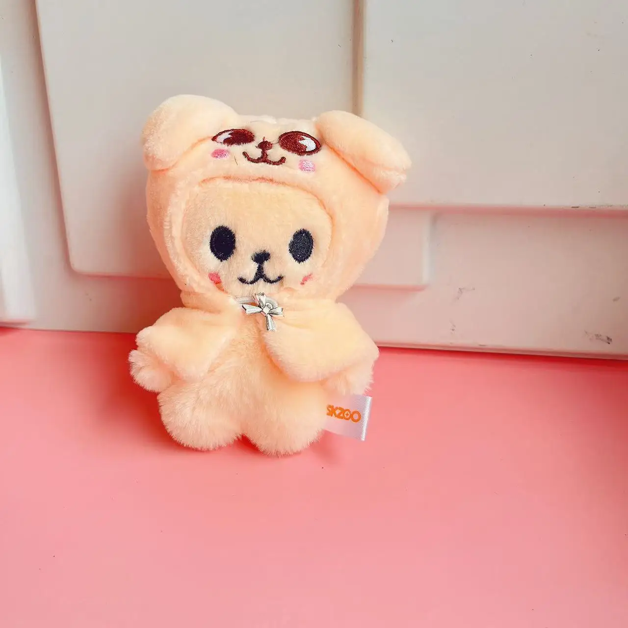 FM أسبوعي نفس النمط SKZOO 10 سنتيمتر عباءة الطفل ، ملابس الطفل ، المفاتيح ، فانغ يمكن الضالة دمية الاطفال دمية