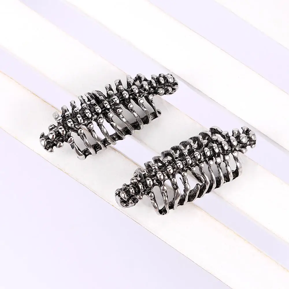 التفاف الرجعية العمود الفقري للجنسين الرجال كليب مسمار اليد مثقوب الأقراط الجمجمة الشرير القوطية