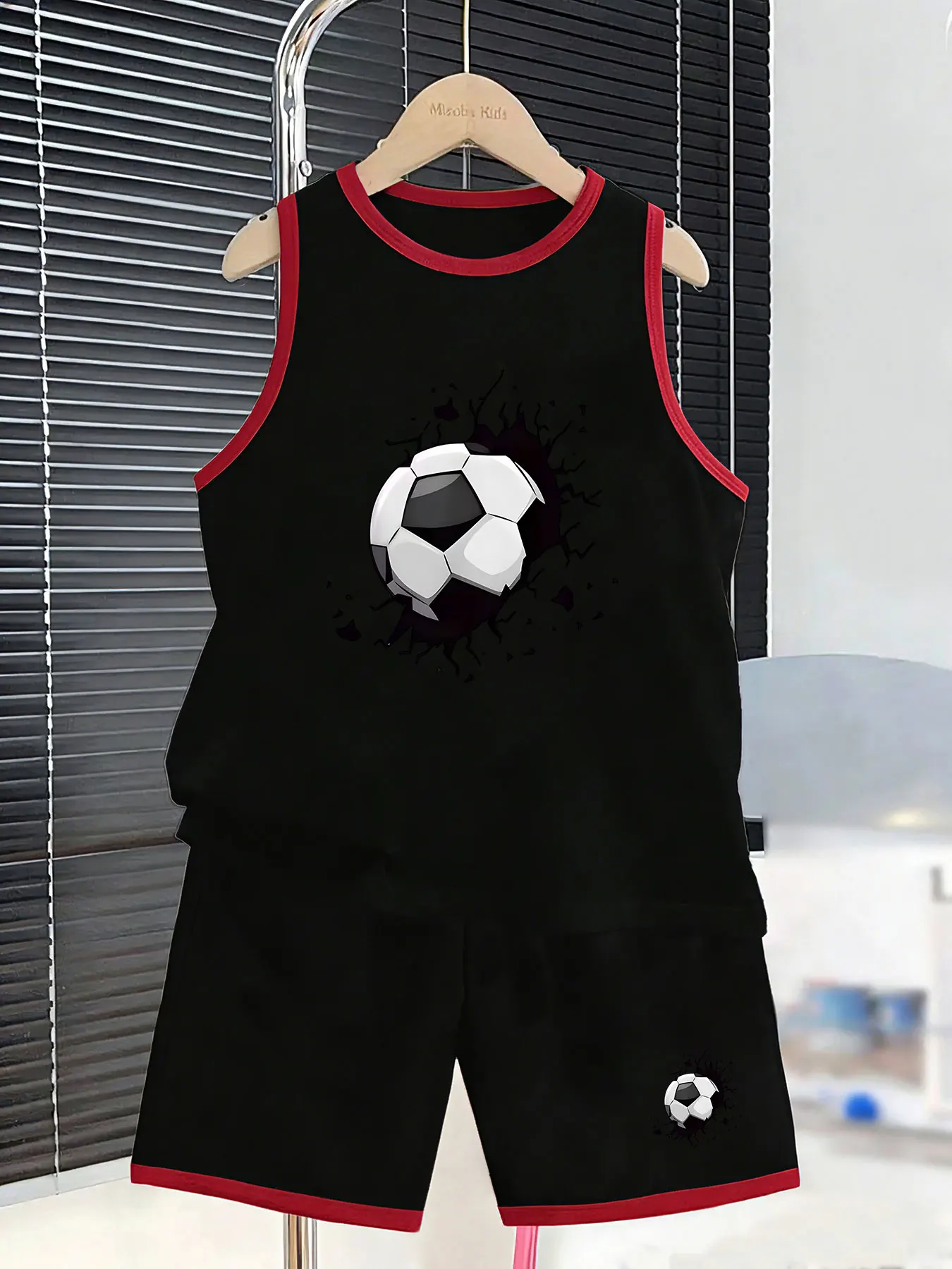 Boys' Football Wall-Breaking Style Vest and Shorts Two-Piece Set, creating a sporty summer look. Selected breathable and skin-fr