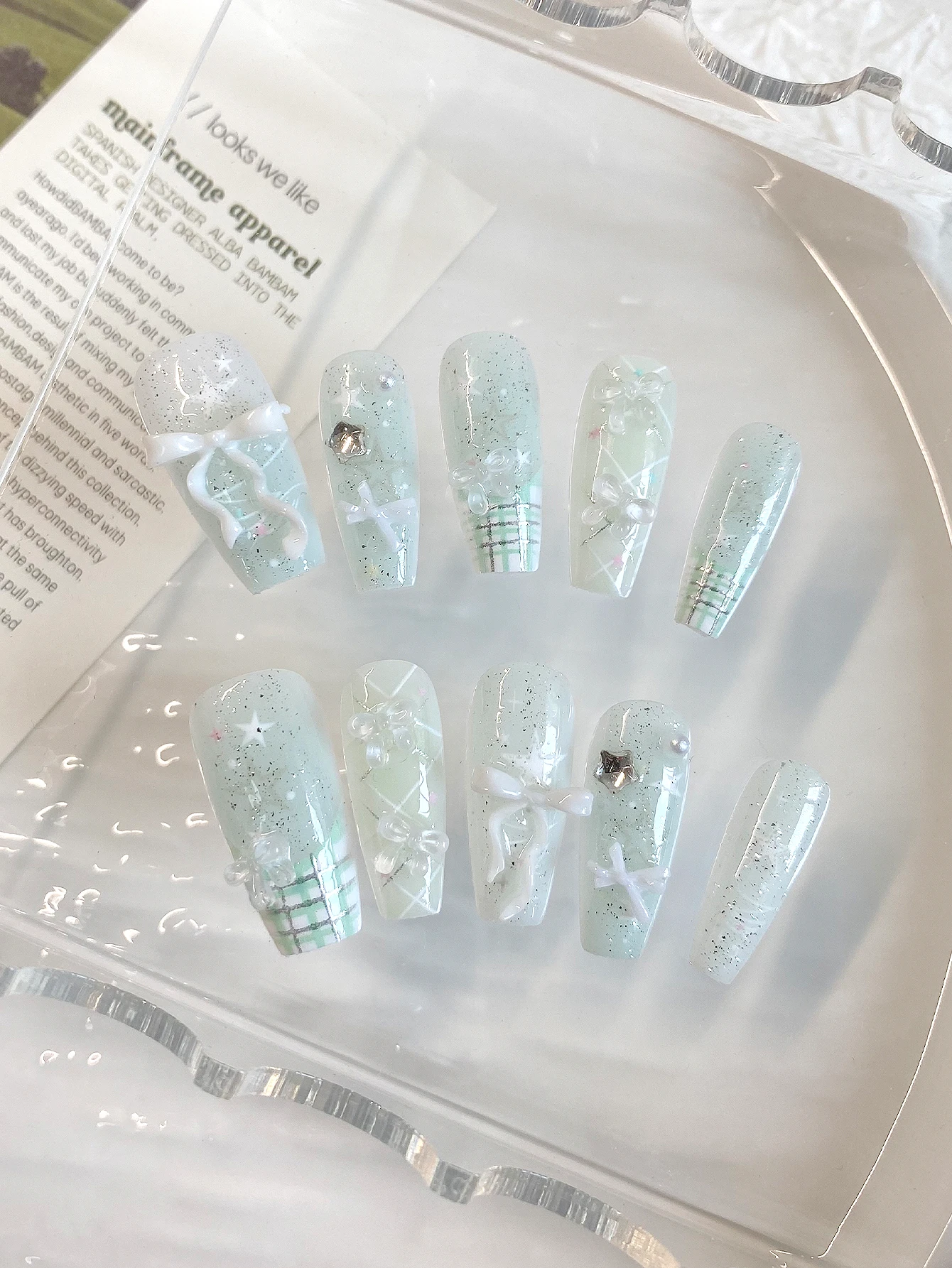 10-Piece Set of Mint Green Plaid Bow Glitter Press-On Nails, with a Clean, Long Trapezoidal Shape That Elongates the Finger Lines, Narrows the Width of the Fingertips, and Enhances Short, Thick Nails. Perfect for Campus Style, Jk Outfits, Summer Picnics, and Girl Photoshoots.