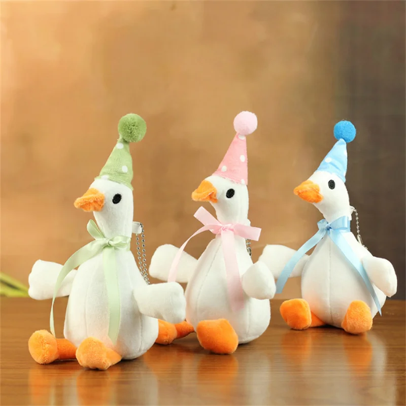 

Approximately 20cm Cute White Goose Keychain Plush Toy Figurine Large Goose Bag Hanging Ornament Key Ring Doll Fabric Doll