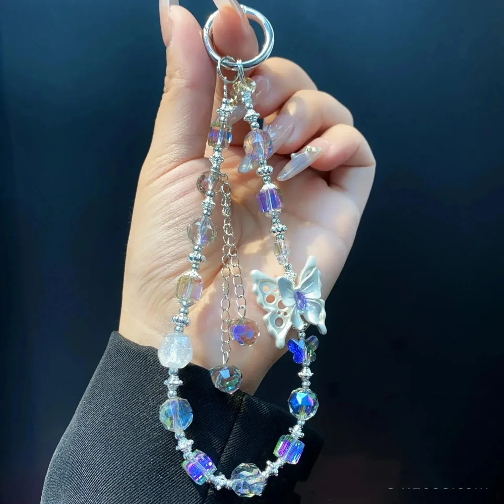 Porte-clés élégant en alliage de perles de cristal papillon, pendentif de téléphone portable à paillettes détachables, lanière de téléphone colorée pour femmes et filles
