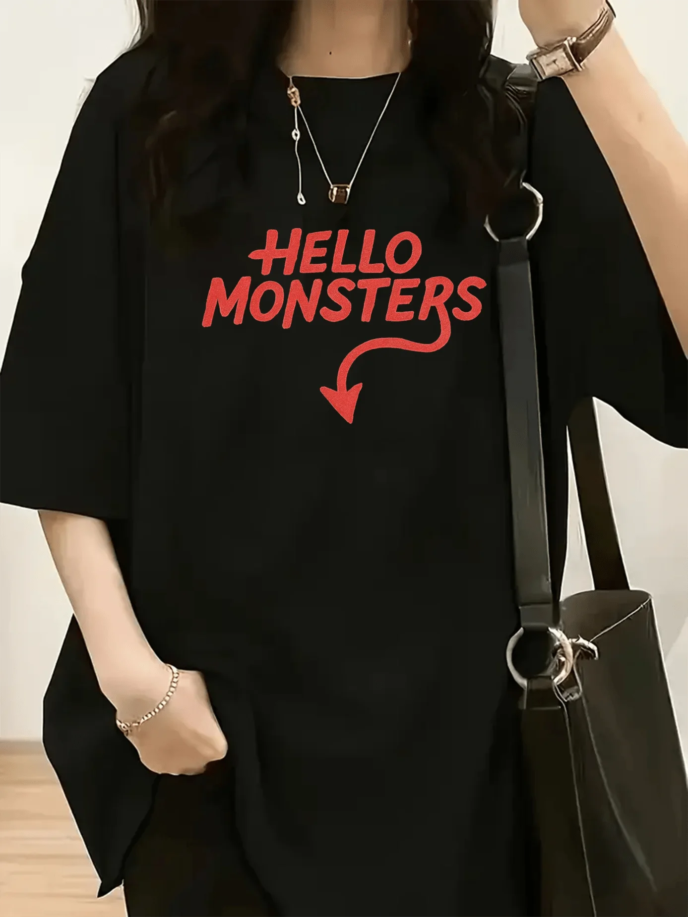 A stylish women's T-shirt in vibrant red, featuring the text 