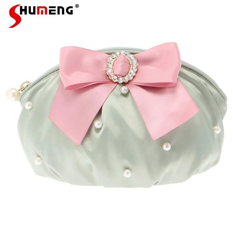 

2023 Summer New Cute Woman Pure Desire Delicate Bow Satin Cosmetic Bag Sweet Ladies Card Holder Storage Pearl Cosmetic Bags