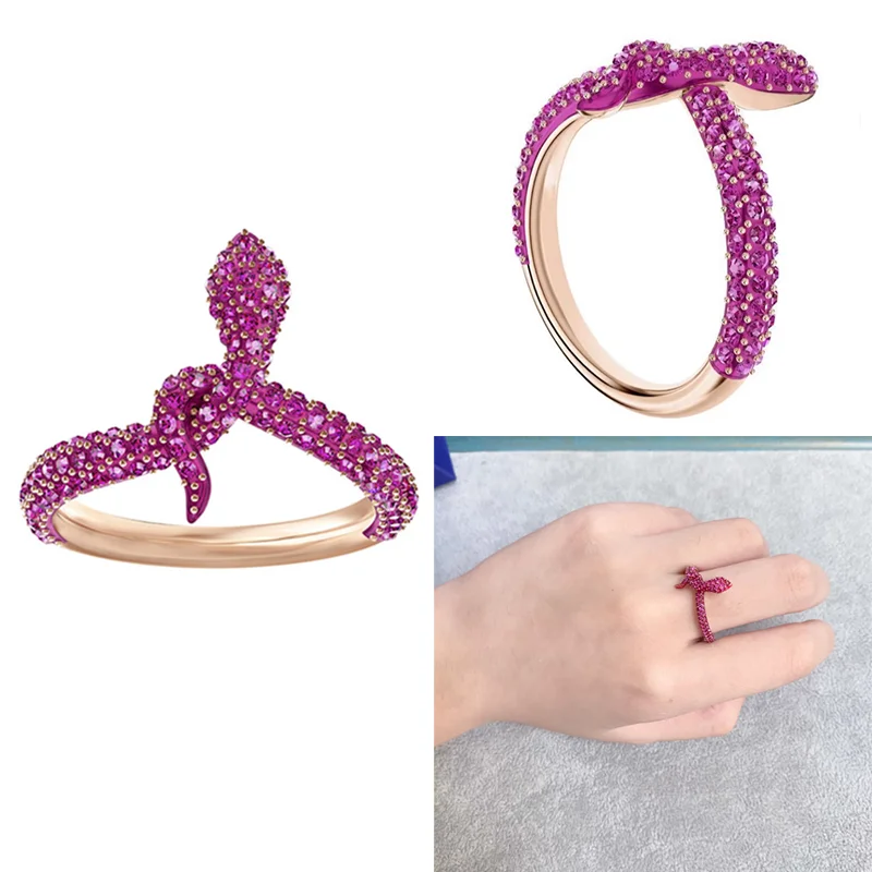 

Кольцо с фианитами в форме змеи цвета фуксии