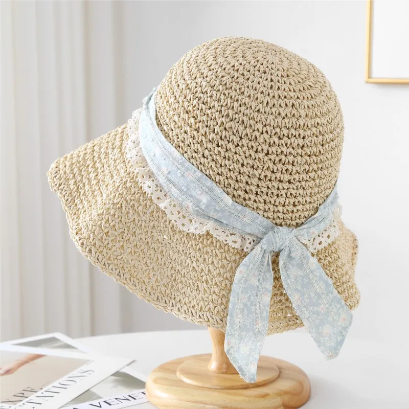 A hat girl goes on seaside vacation woven with large outdoor brim that shows off the face small breathable