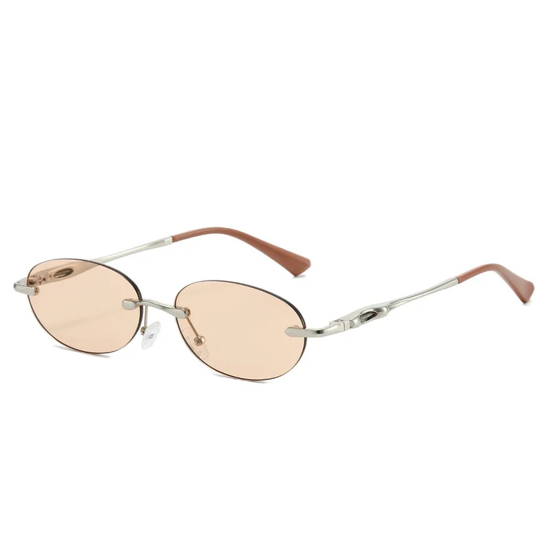 Korean version of fashion frameless oval shape sunglasses men and women driving travel sunglasses