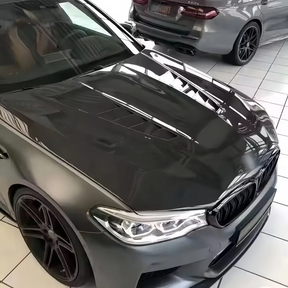

Подходит для обновления и модификации BMW M5 F90 с V-образной защитной крышкой двигателя из сухого углеродного волокна и капотом двигателя.