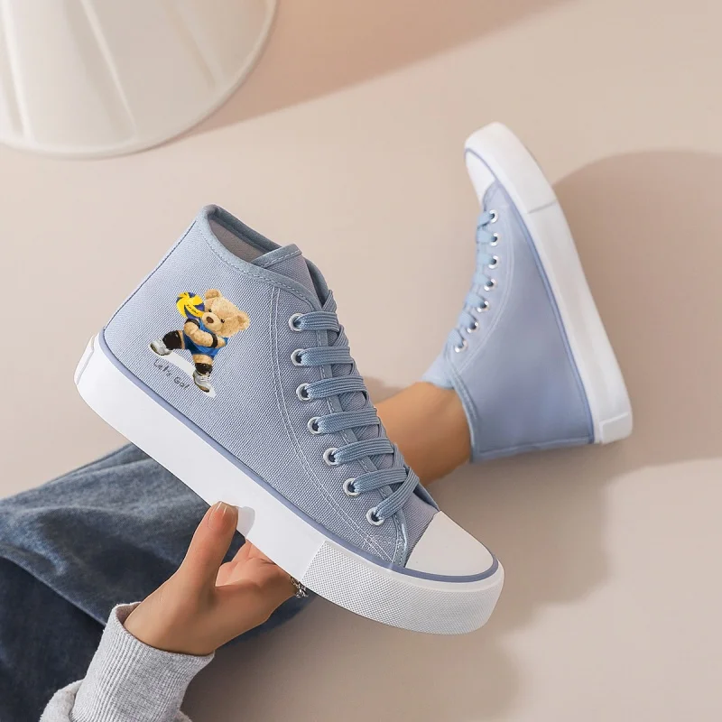 

Women's Light Blue High-Top Canvas Sneakers: Platform Sole & Lace-Up. Cartoon Bear Print for Casual, School & Daily Wear.