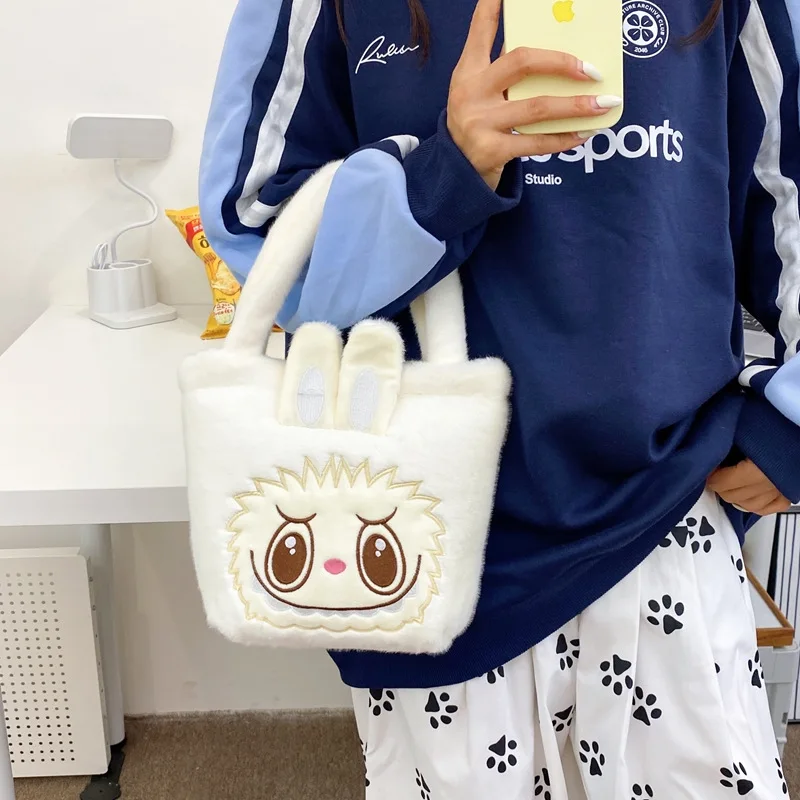 Monster Labubu-Bolso de mano de felpa para mujer y niña, bolsa de maquillaje portátil Kawaii, monedero, Mochila Infantil, bolsa de viaje