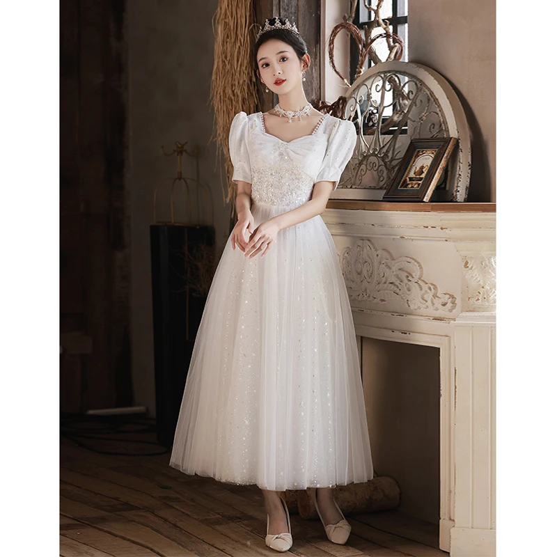 فساتين سهرة بيضاء للنساء أنيقة بياقة مربعة وأكمام منتفخة مزينة بالترتر مطرز بالخرز مأدبة مزاجه فساتين حفلات الزفاف