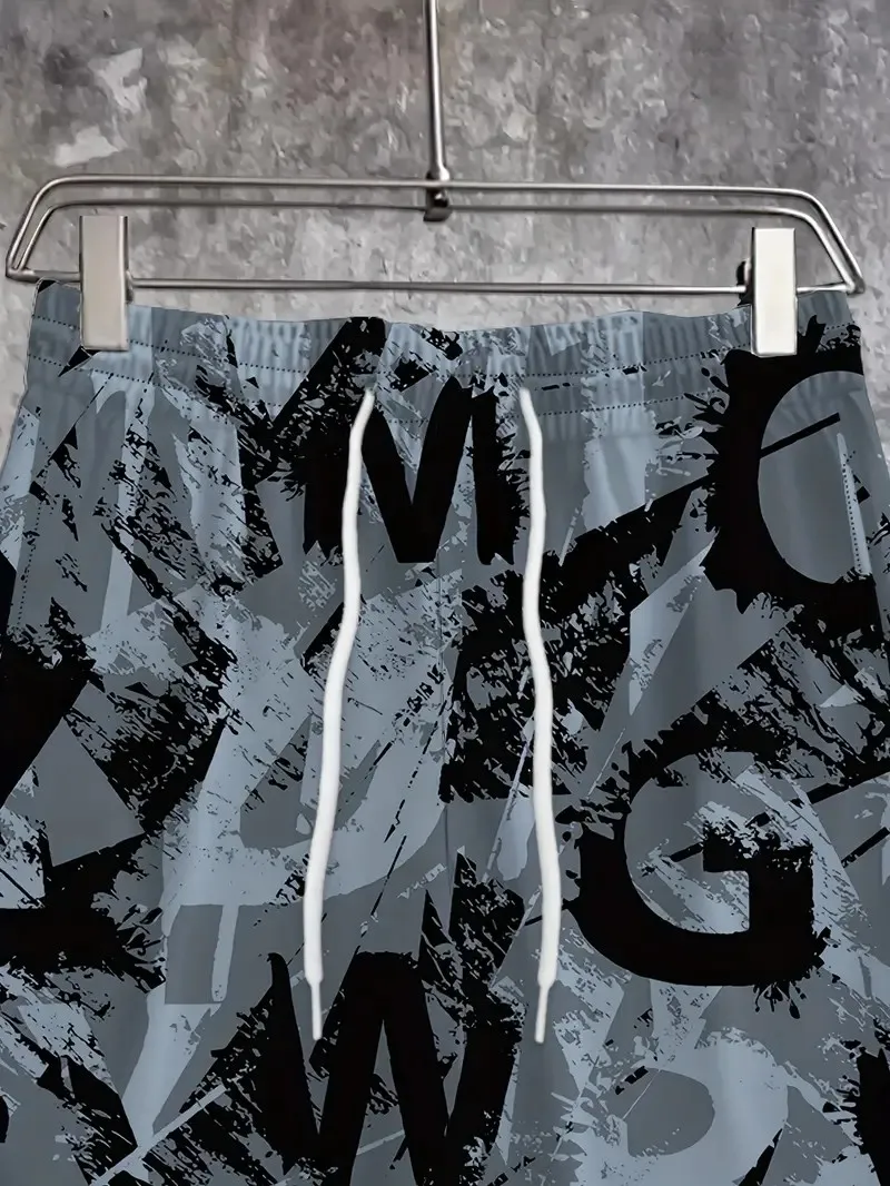 I nuovi pantaloni da uomo per la primavera e l'autunno del 2025 sono comodi, morbidi, casual e con stampe di lettere per pattinaggio a rotelle