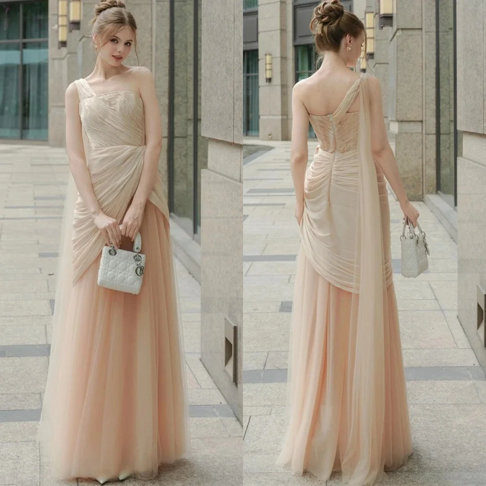 

Custom light pink spaghetti strap backless floor-length gown with silky draping fabric, simple elegant silhouette, fully persona
