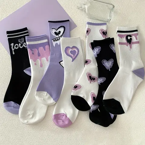 5 paires de chaussettes longues décontractées et confortables pour femmes, imprimées de motifs papillon/cœur/lettre, polyvalentes et confortables.