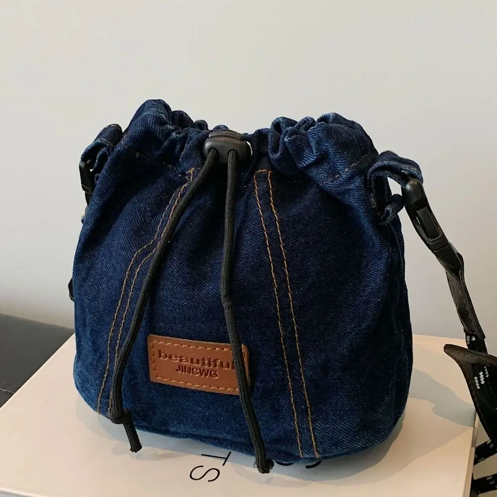 シンプルなヴィンテージ巾着クロスボディバッグ大容量カジュアルデニムキャンバスバッグハンドバッグ無地ジーンズショルダーバッグ女性