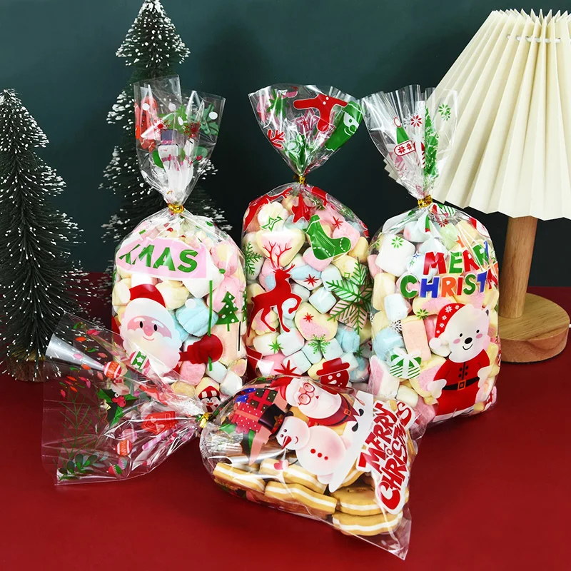 50pcs Plastic Christmas Gift bags Cartoon Pattern Transparent sealed bag Xmas Gift Candy Biscuit Baking Goodie Packaging Bag