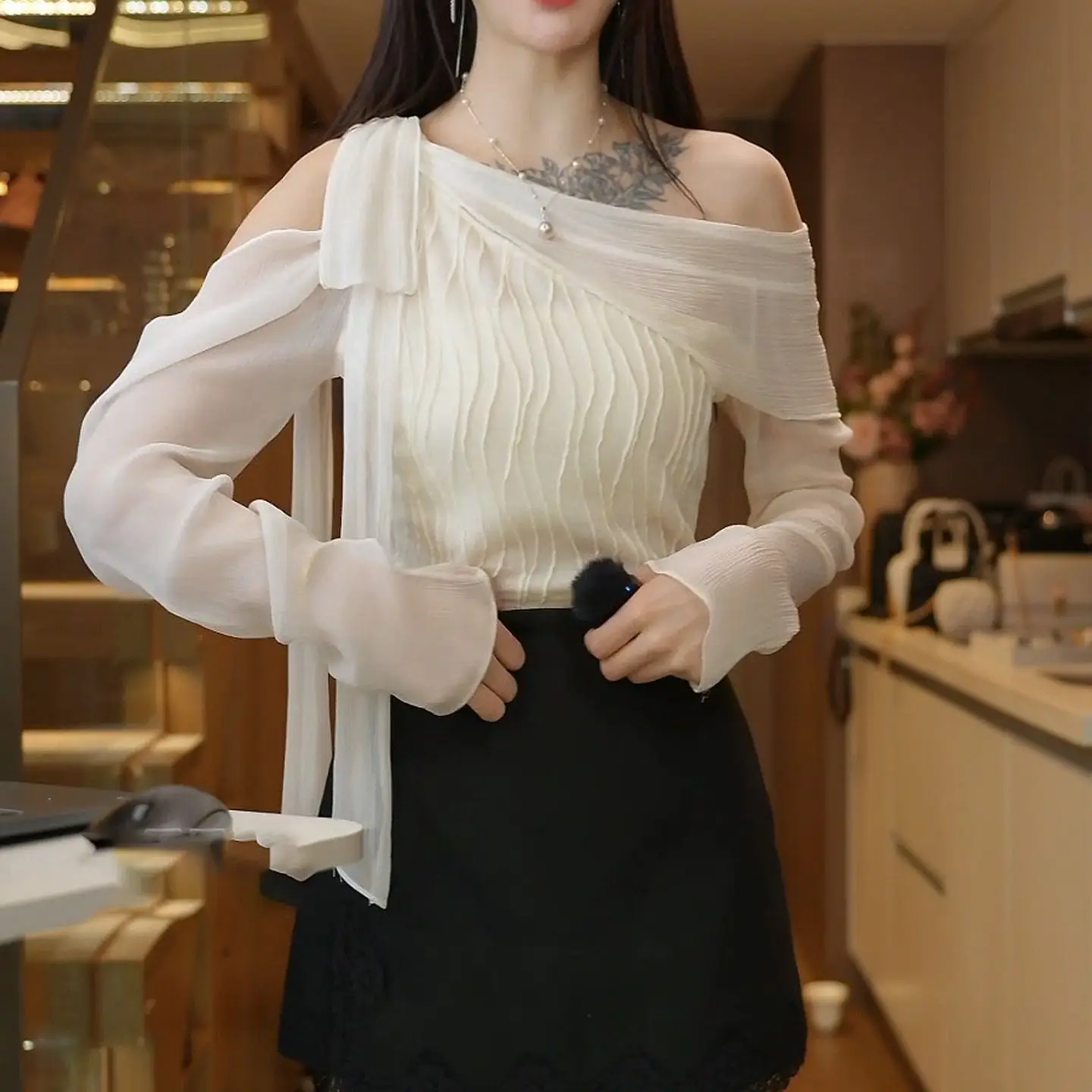 

French lace-up slanted shoulder off-shoulder long-sleeved chiffon shirt women's 2026 autumn new design fashionable top