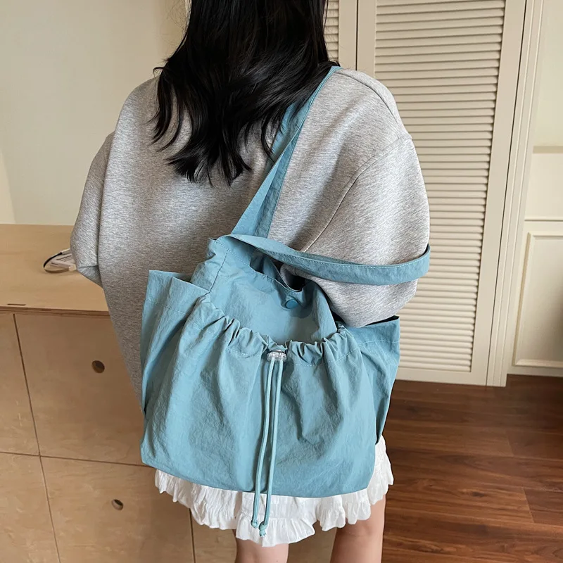 

Новая сумка для путешествий и повседневного использования 2025 года: вместительная холщовая сумка через плечо в корейском стиле, универсальная сумка для ручной клади