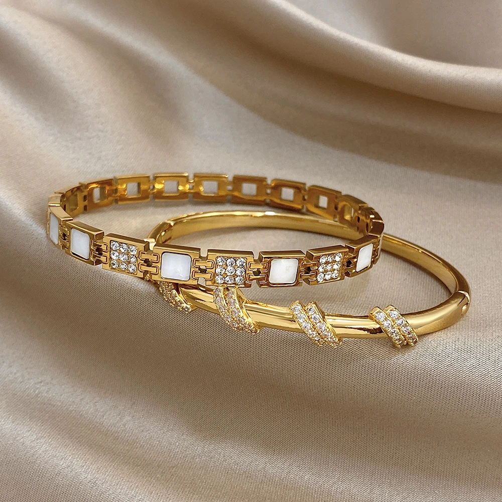 Freetry أنيقة الزركون الفولاذ المقاوم للصدأ الكفة سوار المرأة بسيطة هندسية الملتوية مطلية بالذهب الربيع الإسورة مجوهرات مقاومة للماء