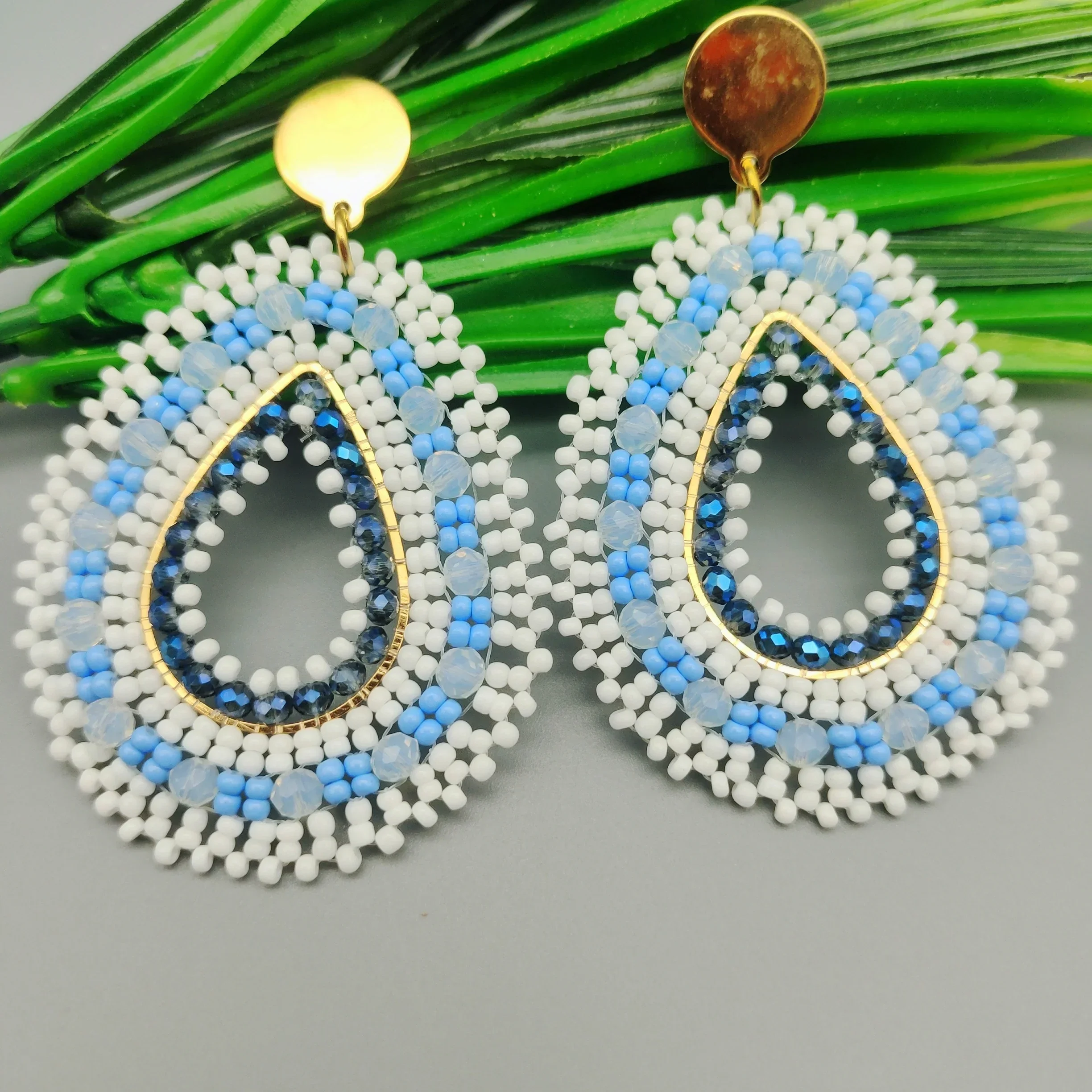ZGMXR Rice bead earrings Water drop  Hollow out Hand knitting Bohemia Alloy Fashion Versatile Geometry Crystal Beaded earrings