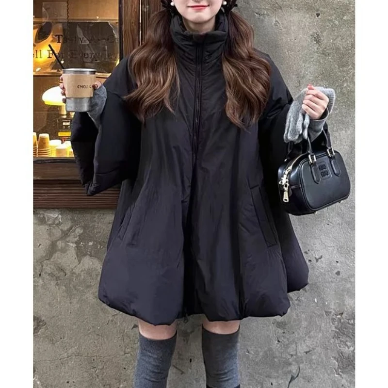 스카프 디자인 감각이 돋보이는 니치 A라인 루즈핏 솜 패딩 코트 재킷 마녀 망토, 중간 길이의 큰 스커트 밑단 코트