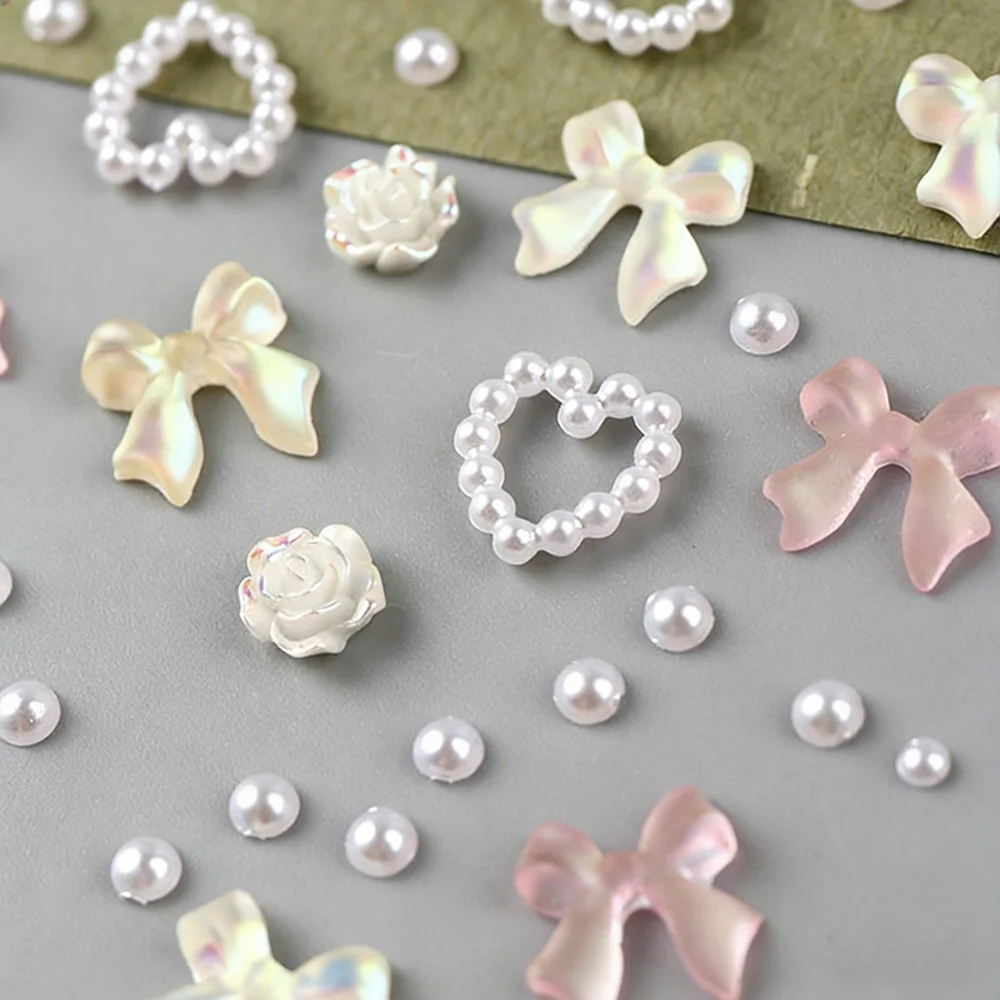 حقيبة واحدة من زينة الأظافر ثلاثية الأبعاد على شكل قلب مجوف مع نصف لؤلؤة مختلطة وعقدة شفافة من الراتنج، إكسسوارات أظافر لعيد الحب