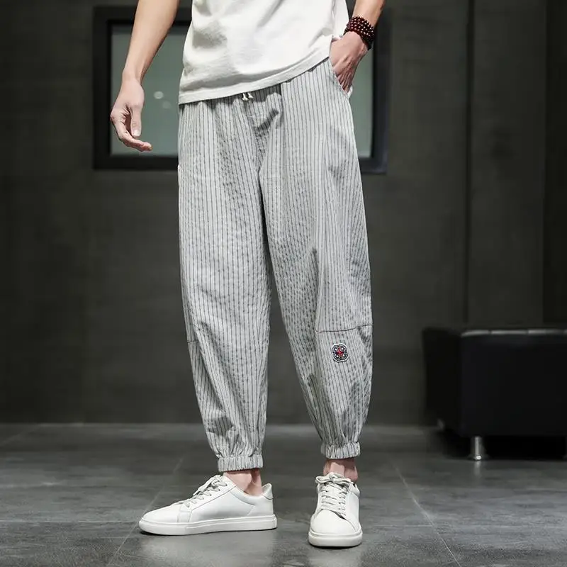 Ropa de cintura alta para hombre, pantalones informales de algodón sólido con bolsillos que combinan con todo, moda de primavera y verano