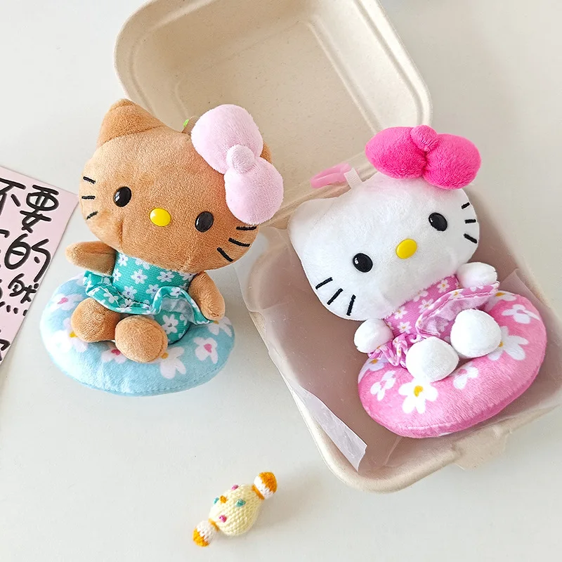 New Hawaii Black Leather Swimming Circle Hello Kitty Plush Doll Pendant Cartoon KT Cat Doll Bag Hanging Gift