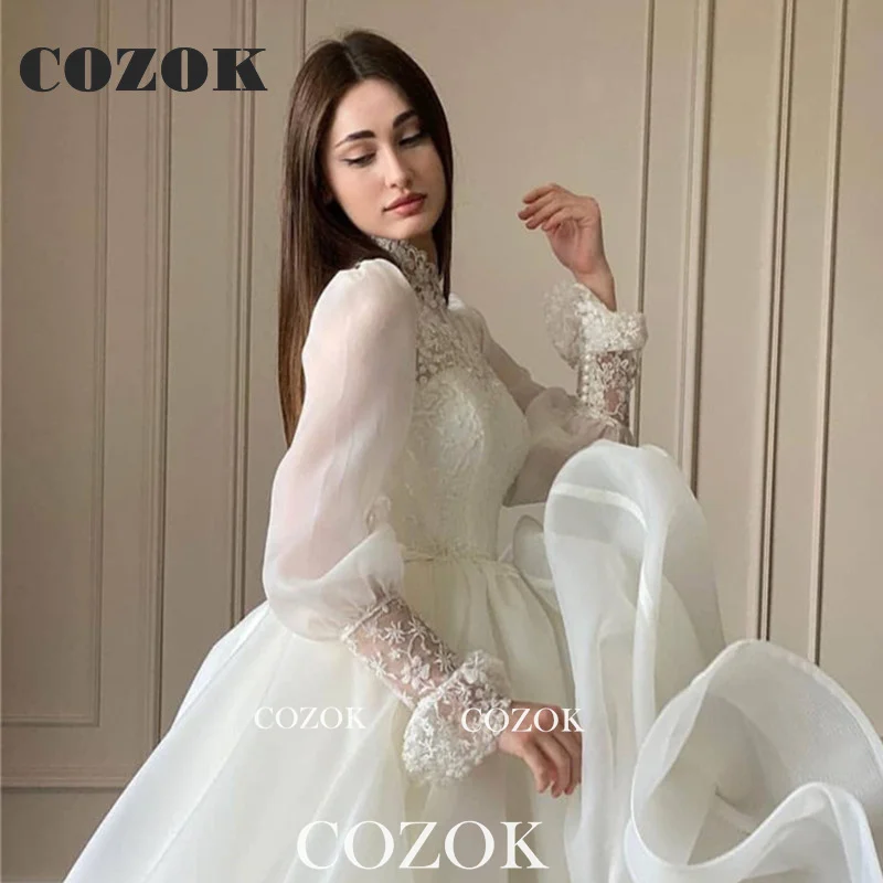 Modesto organza uma linha apliques vestido de casamento do laço puff mangas compridas alta pescoço vestidos de noiva robe de mariage personalizado tg001